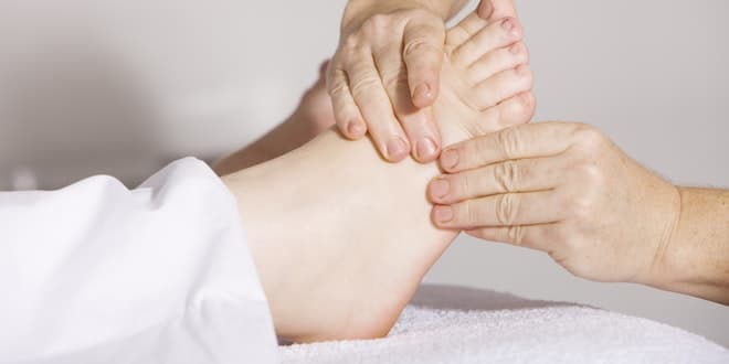 A person getting a foot massage.