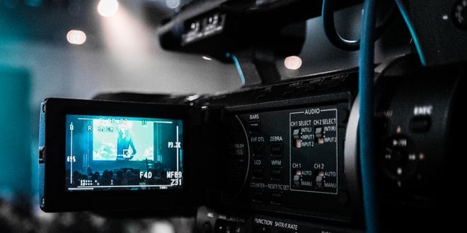 A video camera is shown at an event.