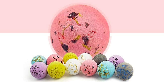 A pink and gold easter egg on a pink background.